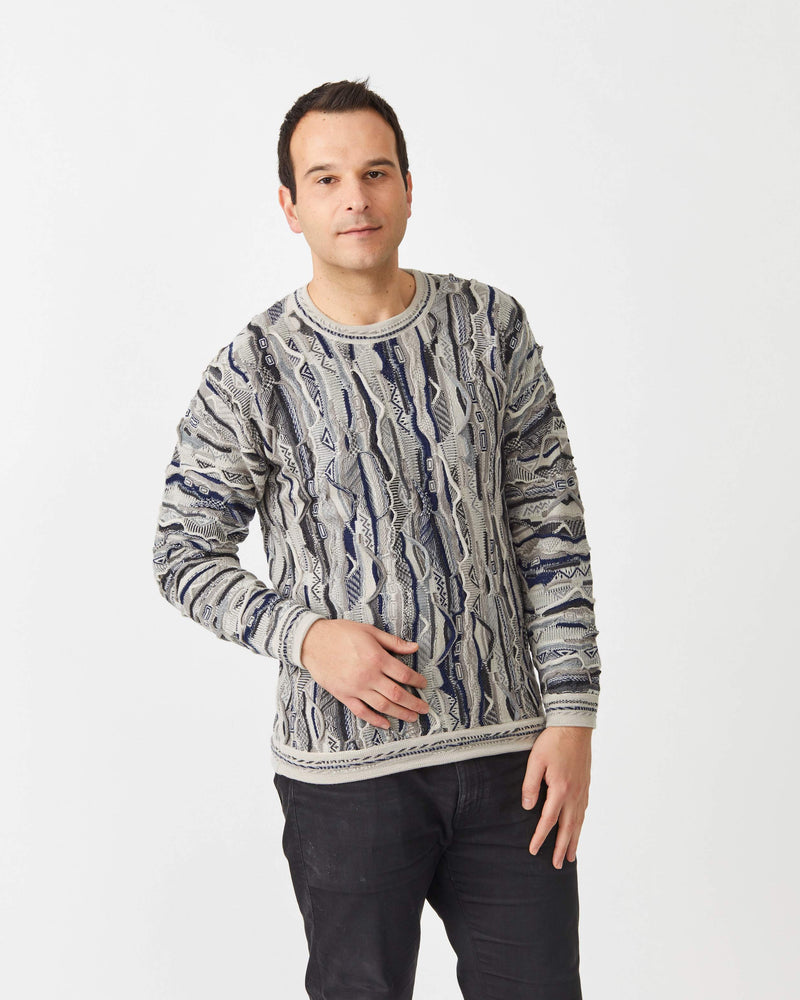 man wearing 3D knitted sweater in wheat