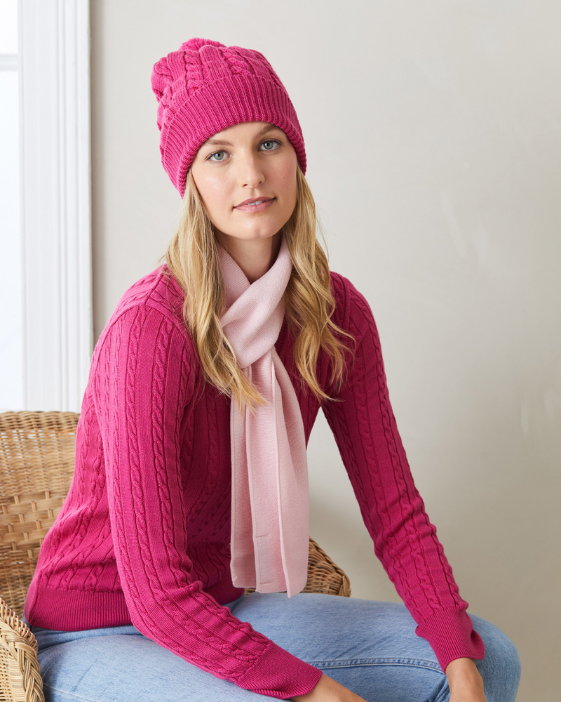 lady and man wearing red and navy woolen scarf