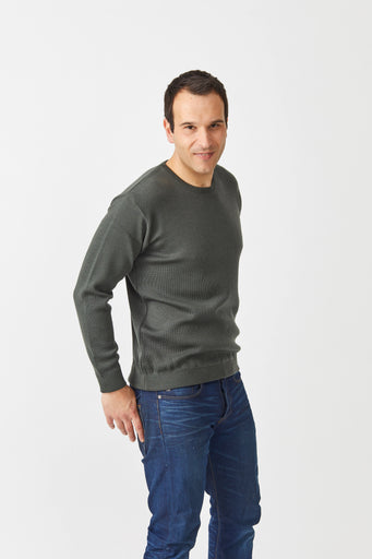 green woolen sweater