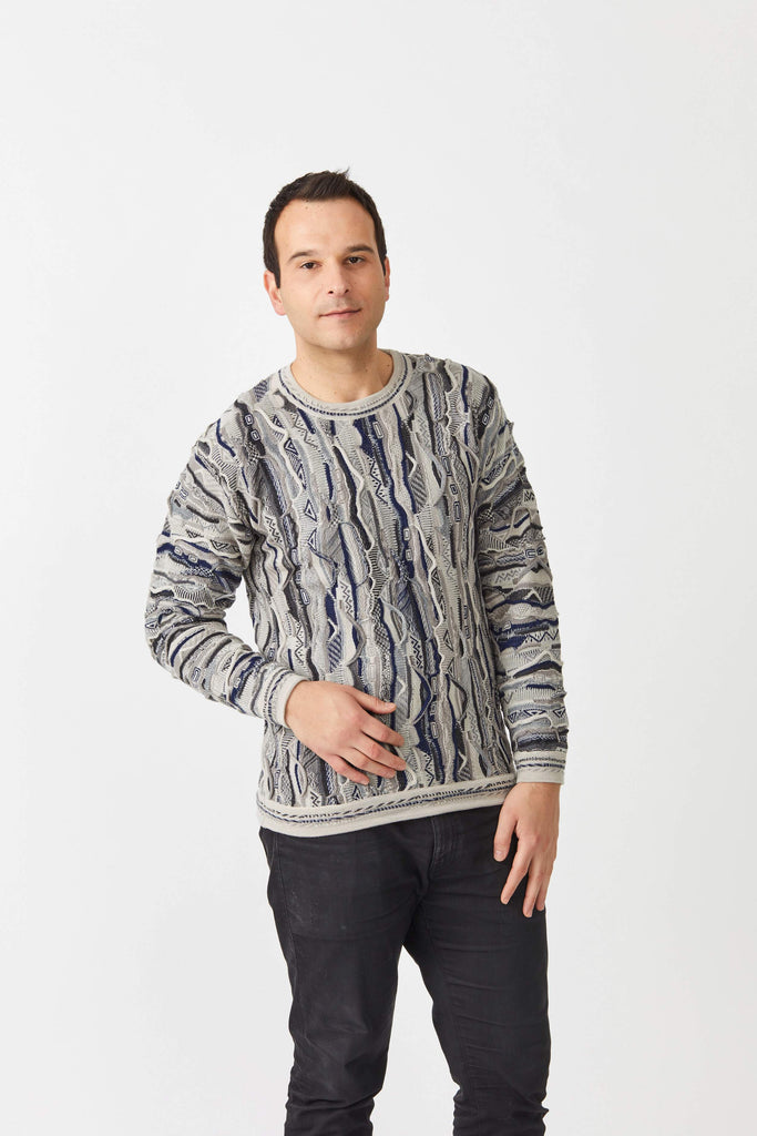 man wearing 3D knitted sweater in wheat