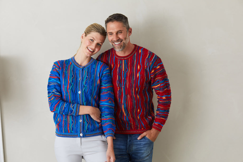 man and lady in 3D sweaters multi colour